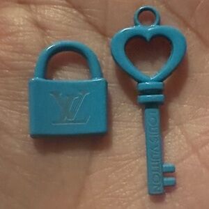 Louis Vuitton Lock and Key Charm Set in the shade of Tiffany Blue